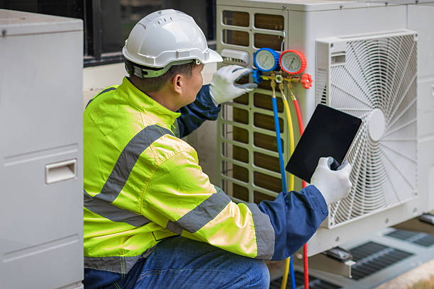 Professional Air Duct Cleaning technician working in Lula, GA